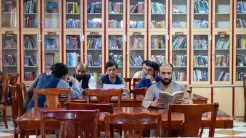 The governing authority ban books written by women from the nation's universities